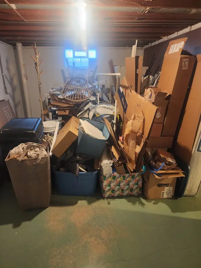 Roll-off dumpster container at job site for 2 Yard Dumpster Rental in North Branch